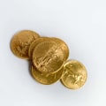 Is it better to buy old or new gold coins?